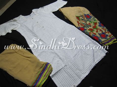 White Chicken Kurti With Phulkari Shalwar And Dupatta Kurti And Shalwar