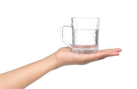 Premium Photo Hand Holding A Glass With Water Isolated On A White