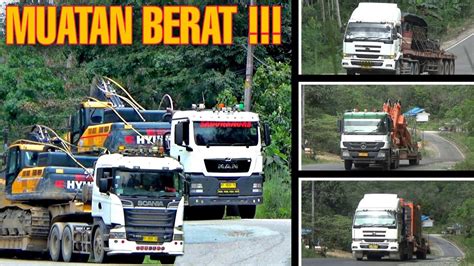 Lowboy Trailer Truck Bermuatan Alat Berat Melintas Di Jalur Ekstrim