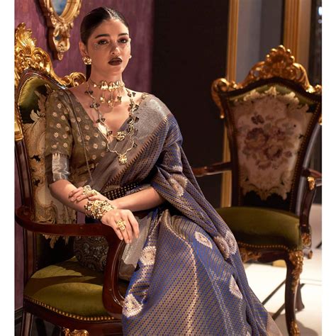 navy blue woven art silk saree  tassels gold zari weaving sets