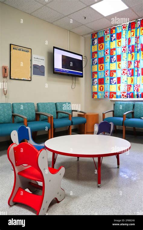 Waiting room at a pediatric clinic with small, colorful table and ...