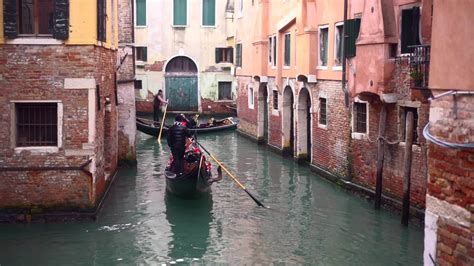 Tourism in Italy, A Gondola Ride in Venice 12193673 Stock Video at Vecteezy