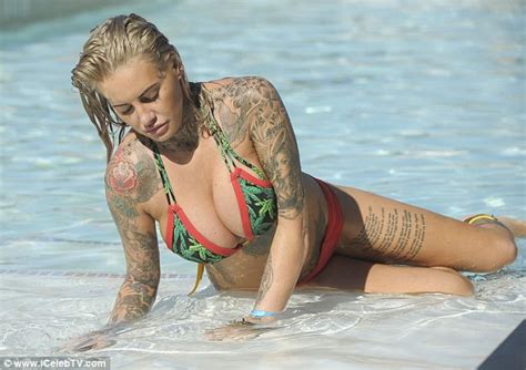 Jemma Lucy Flaunts Her Ample Assets And Tattoos In Tiny Print Bikini In Ibiza Daily Mail Online