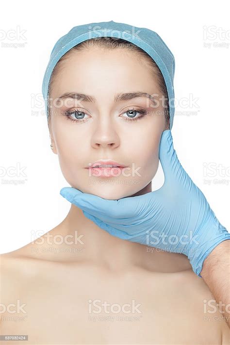 Plastic Surgery Concept Doctor Hands In Gloves Touching Woman Face