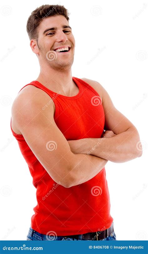 Smiling Muscular Man Posing With Crossed Arms Royalty Free Stock Photos