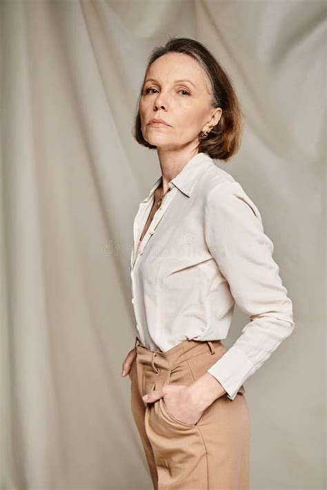 Mature Woman In Tan Pants And Stock Image Image Of Caucasian Delightful