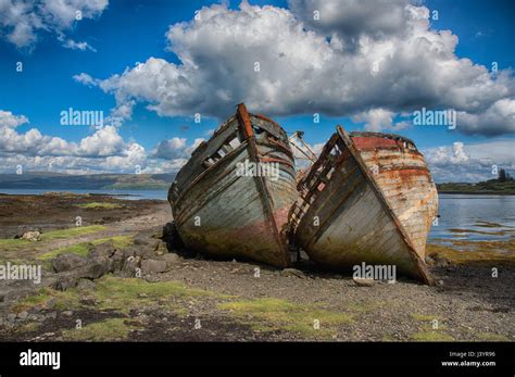 Two Old Derelict Wooden Fishing Boats Abandoned On Salen Beach On The