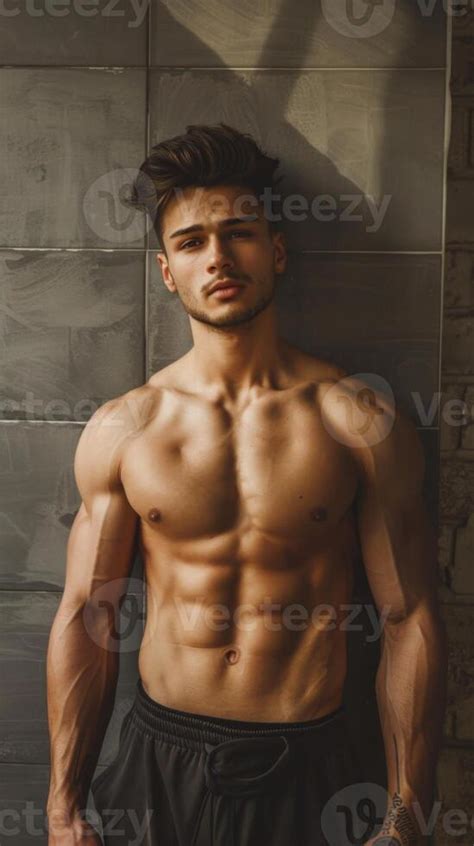 Shirtless Man Leans Against Wall 46162575 Stock Photo At Vecteezy