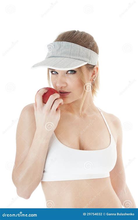 Beautiful Seductive Female Tennis Player With Red Apple Stock Photo