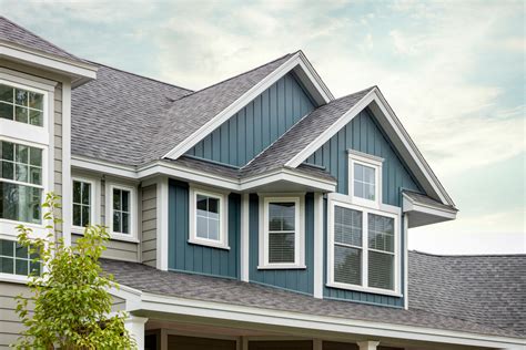 Classic Home With Clapboard And Board Batten Siding In Windham Nh