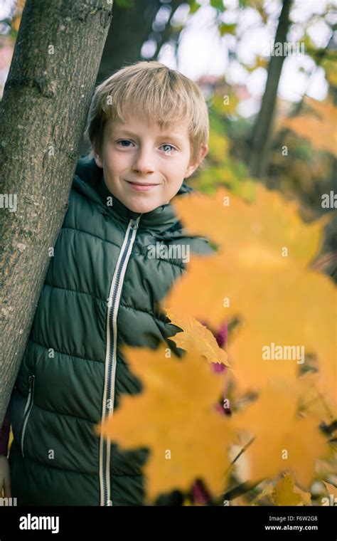 Boy Leaning Against Tree Hi Res Stock Photography And Images Alamy