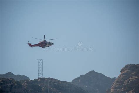 A Lafd Augustawestland 139 Helicopter Makes A Water Drop On A Brush