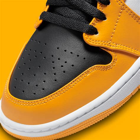 Air Jordan 1 Mid Yellow Black White 554724-701 | SneakerNews.com