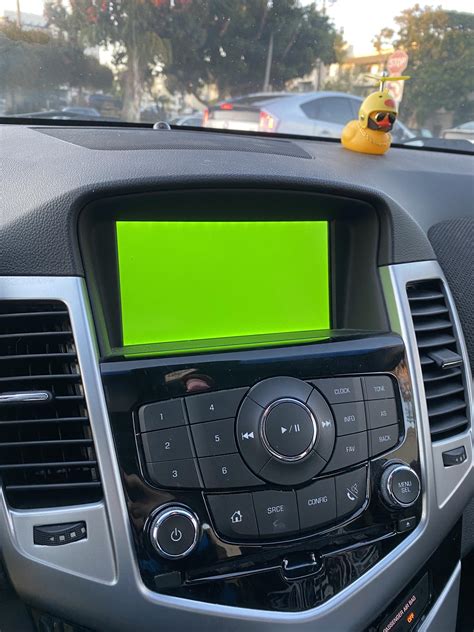 My car radio glitched into a green screen : r/mildlyinteresting