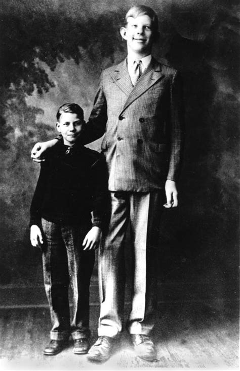 Robert Wadlow The Tallest Man At 10 Years Old In History Pose Next To