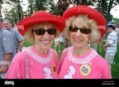 Twin Sisters Who Look Alike And Act Alike As Twins At The Annual Twins