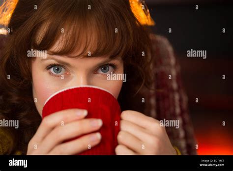 Portrait Of Beauty Redhead Drinking Hot Drink At Christmas Stock Photo Alamy