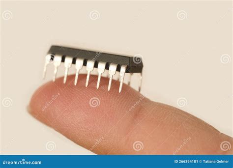 Microchip On Finger Of Female Hand On White Background Research