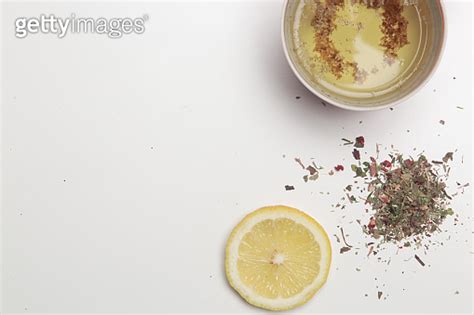 Herbal Tea Top View With Copy Spce Dry Herbs Lemon Slices And Tea