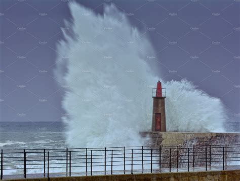 Stormy Wave Over Old Lighthouse Containing Lighthouse Storm And Ocean