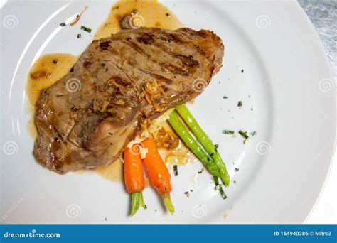 Beef Steak With Brown Sauce And Vegetables Stock Photo Image Of Brown