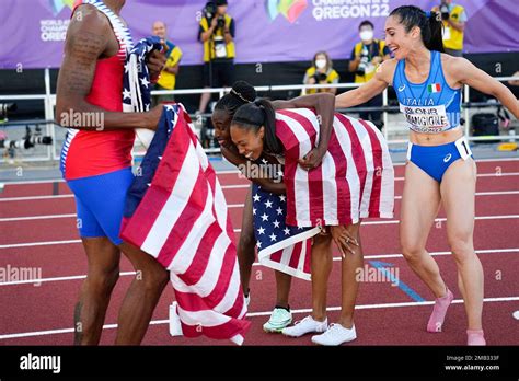 Allyson Felix Of The United States Is Embraced On The Track After The