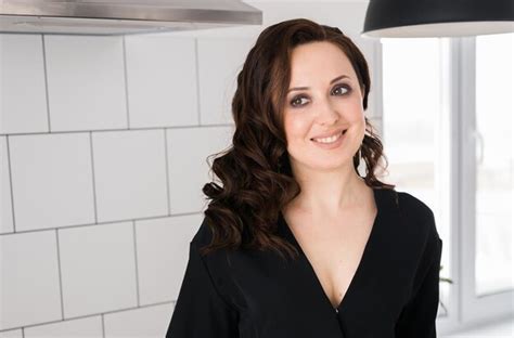 Premium Photo Beauty Brunette Woman Standing In The Kitchen Attractive Female Smiling And