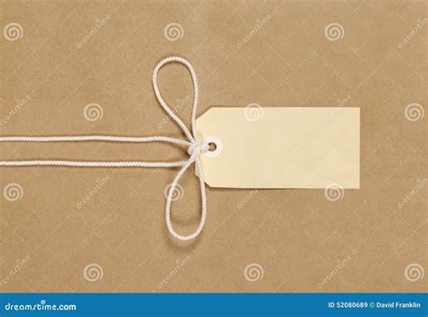 Brown Paket Mit Schnur Und Aufkleber Stockbild Bild Von Nahaufnahme