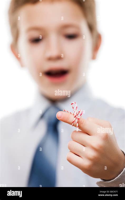 Child Boy Look At Finger Tied String Knot Reminder Stock Photo Alamy