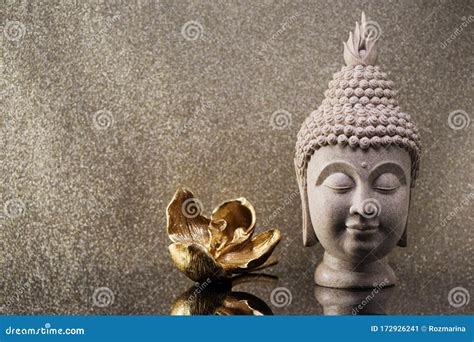 Buddha Head Statue And Golden Orchid Flower Stock Image Image Of