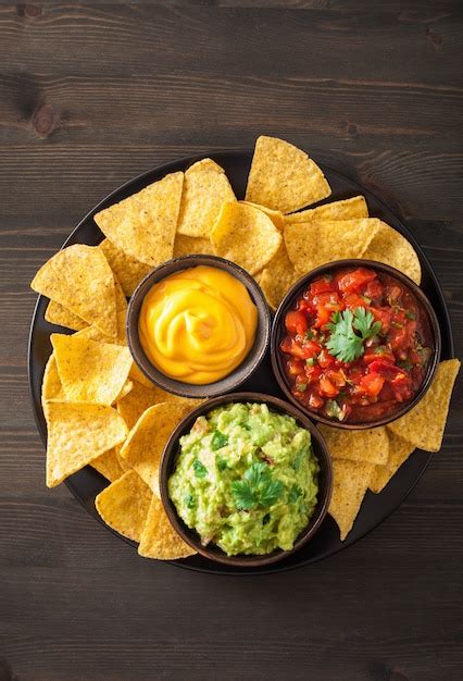 Premium Photo Mexican Guacamole And Salsa Dip With Nachos