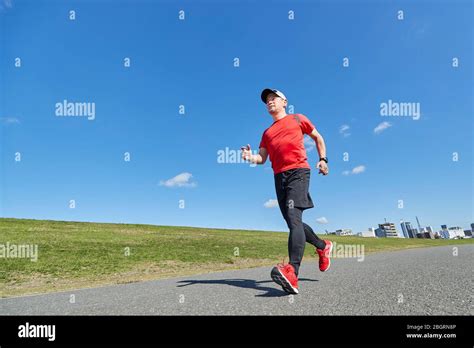 Mature Japanese Man Training Downtown Stock Photo Alamy