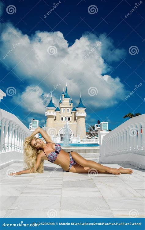 Beautiful Woman In Bikini Posing On The Caribbean Beach And In A Luxury Hotel Stock Photo