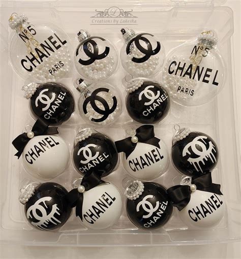 Black And White Ornaments With Chanel On Them