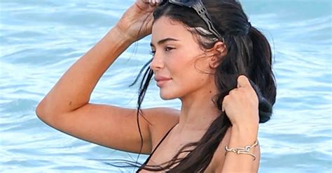 Kylie Jenner Strips To Microscopic Bikini As She Shows Curves In