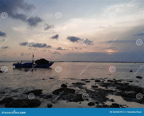 Sunset at Ujung Genteng stock image. Image of shore - 262567013