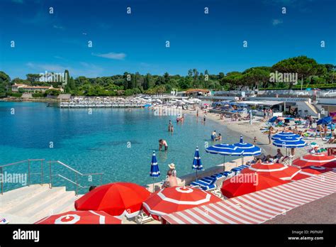 Garoupe Beach Antibes France A Summer Scene With Sunbathers Enjoying