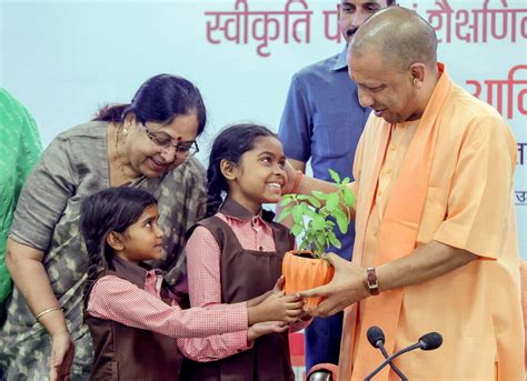 Yogi Adityanath During The Distribution Of Acceptance Letter And School