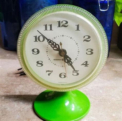 Mid Century General Electric Pedestal Alarm Clock In Kelly Green Color