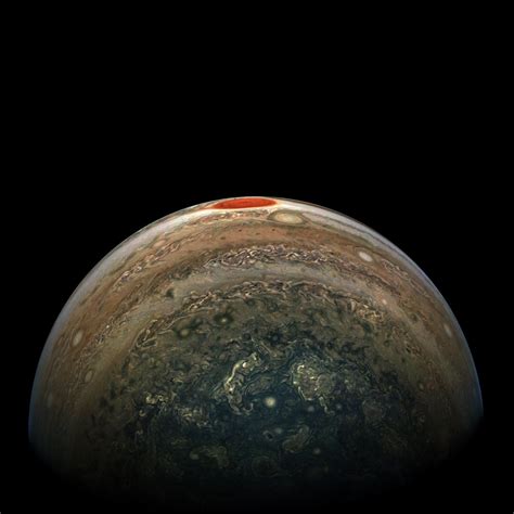 nasas juno spacecraft captured  view  jupiters red spot nasa