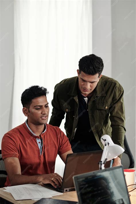 Premium Photo | Software Developers Working in Office