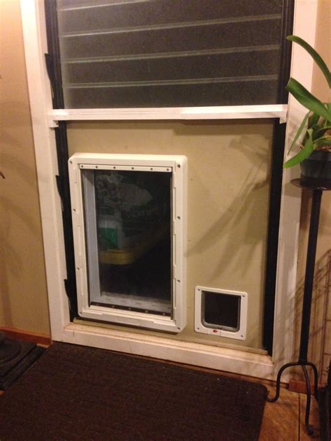 a dog door is open to let the outside in