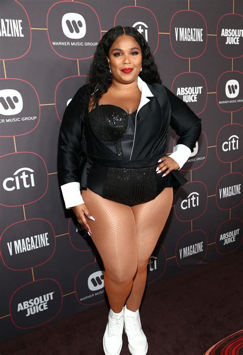 Lizzo dons sexy corset and ditches pants for pre-Grammy party performance