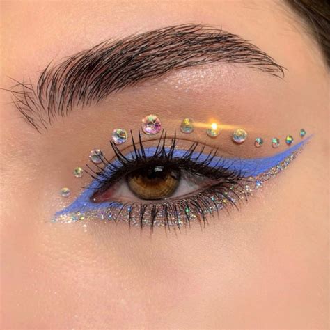 47 Cute Makeup Looks To Recreate Rhinestones Blue Graphic Liner