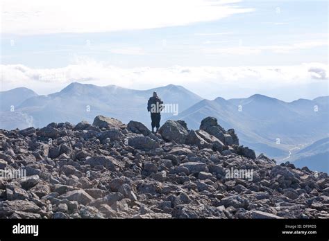 men enjoying view at summit of ben nevis Stock Photo - Alamy