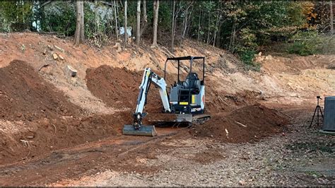 Bobcat Excavator Digging Out For Retaining Wall Youtube