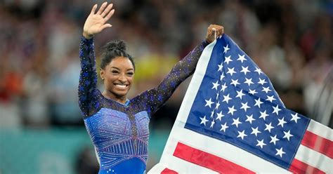 Simone Biles Flashes Diamond Encrusted Goat Necklace After Winning All