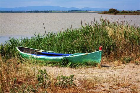 Green Rowboat By The Lake Provence France Photograph By Tatiana