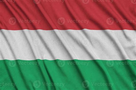 Hungary Flag Is Depicted On A Sports Cloth Fabric With Many Folds