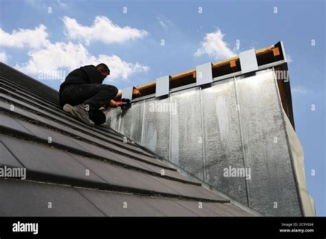 New roof with dormer under construction Stock Photo - Alamy